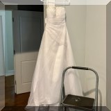 H11. White gown with beaded details. 